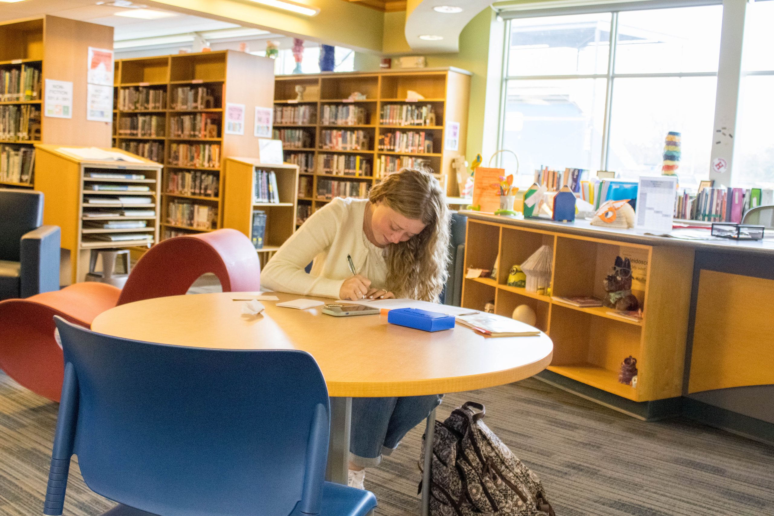 student working in the library
