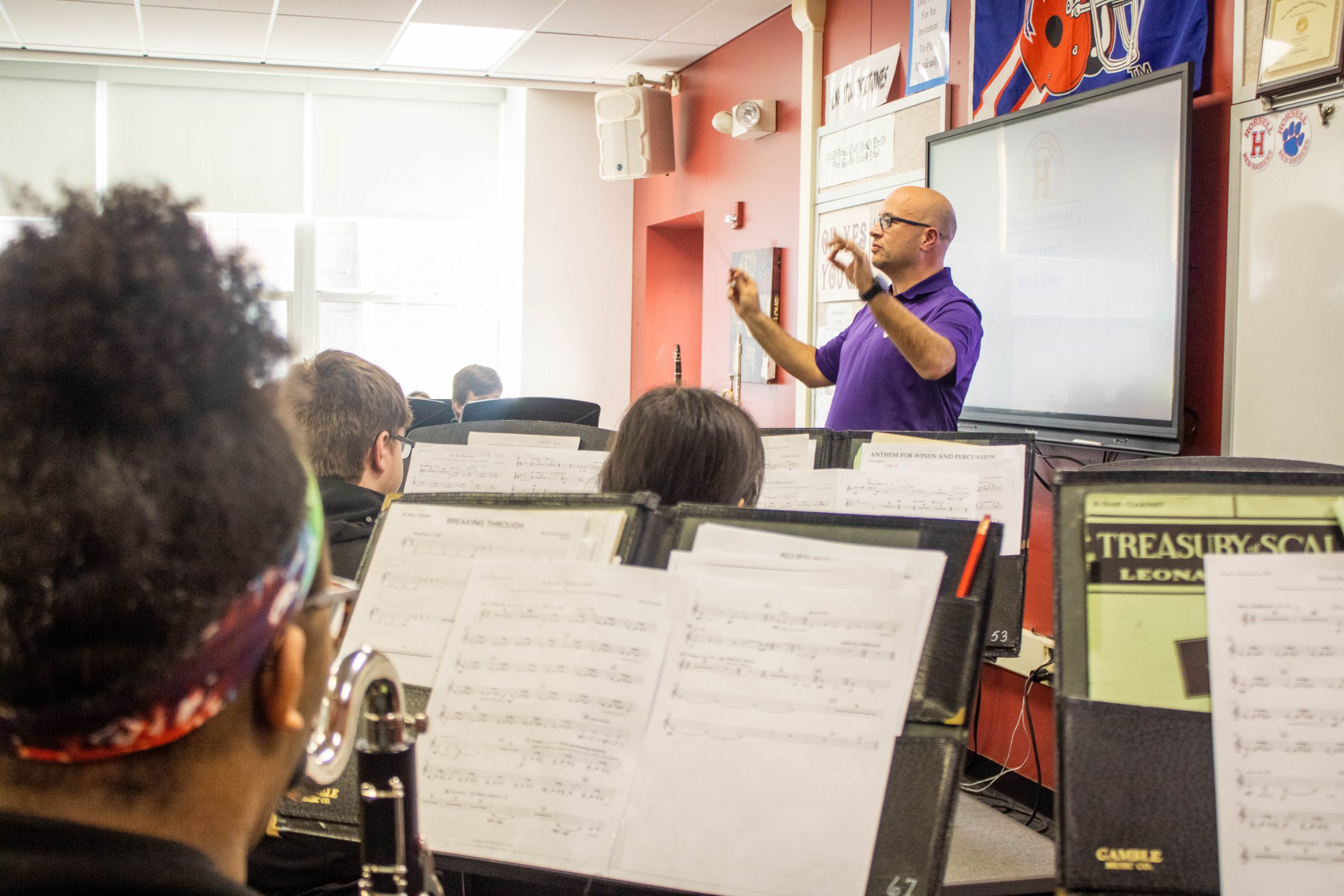  Dr. Jared Chase, Director of Bands at Nazareth College, conducts the Hornell High School Symphonic Band students 
