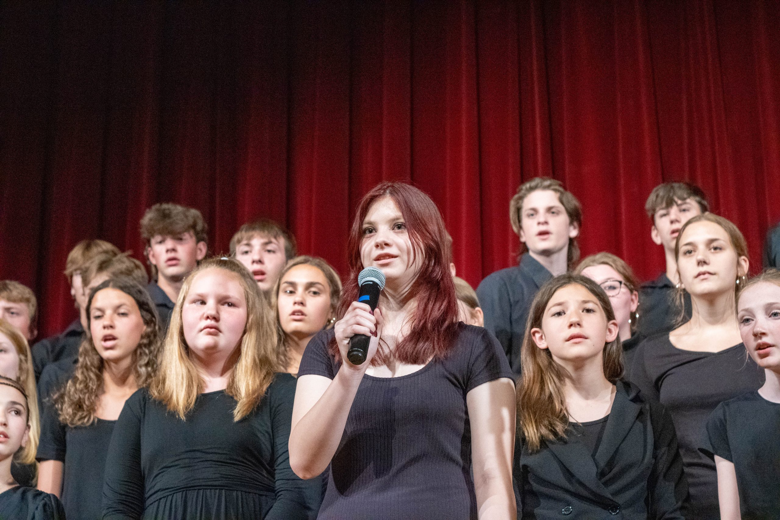 students singing at concert