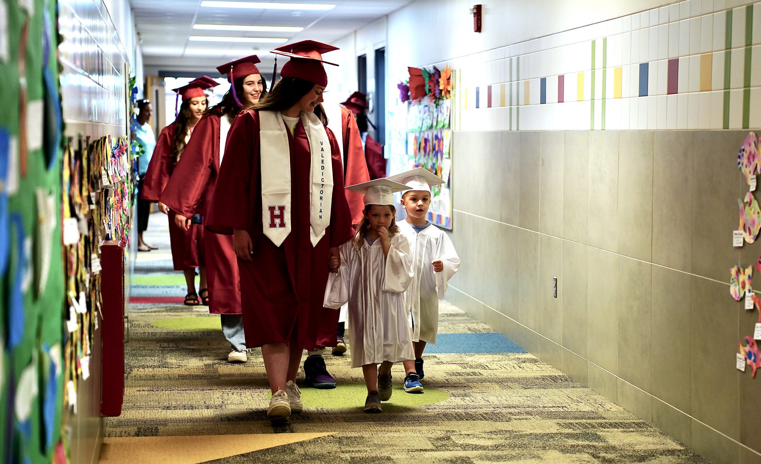 Seniors walk with 4PK graduates down the halls of North Hornell