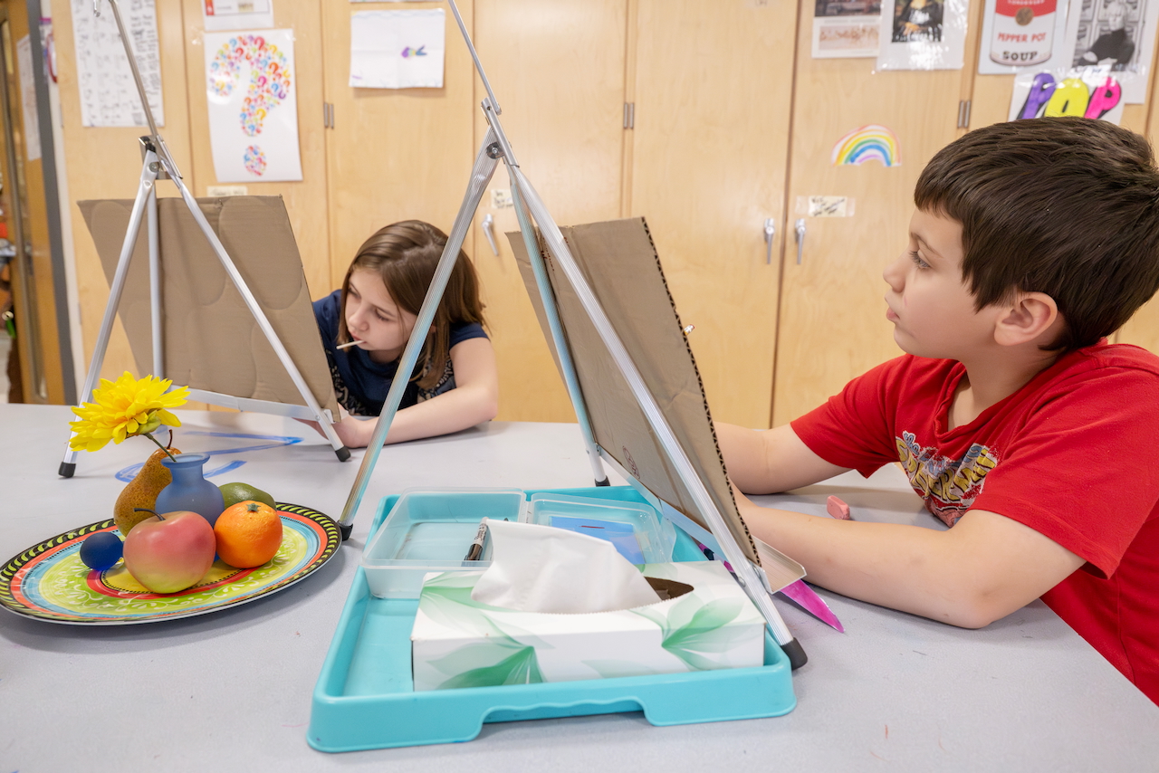 students drawing on the first day of school