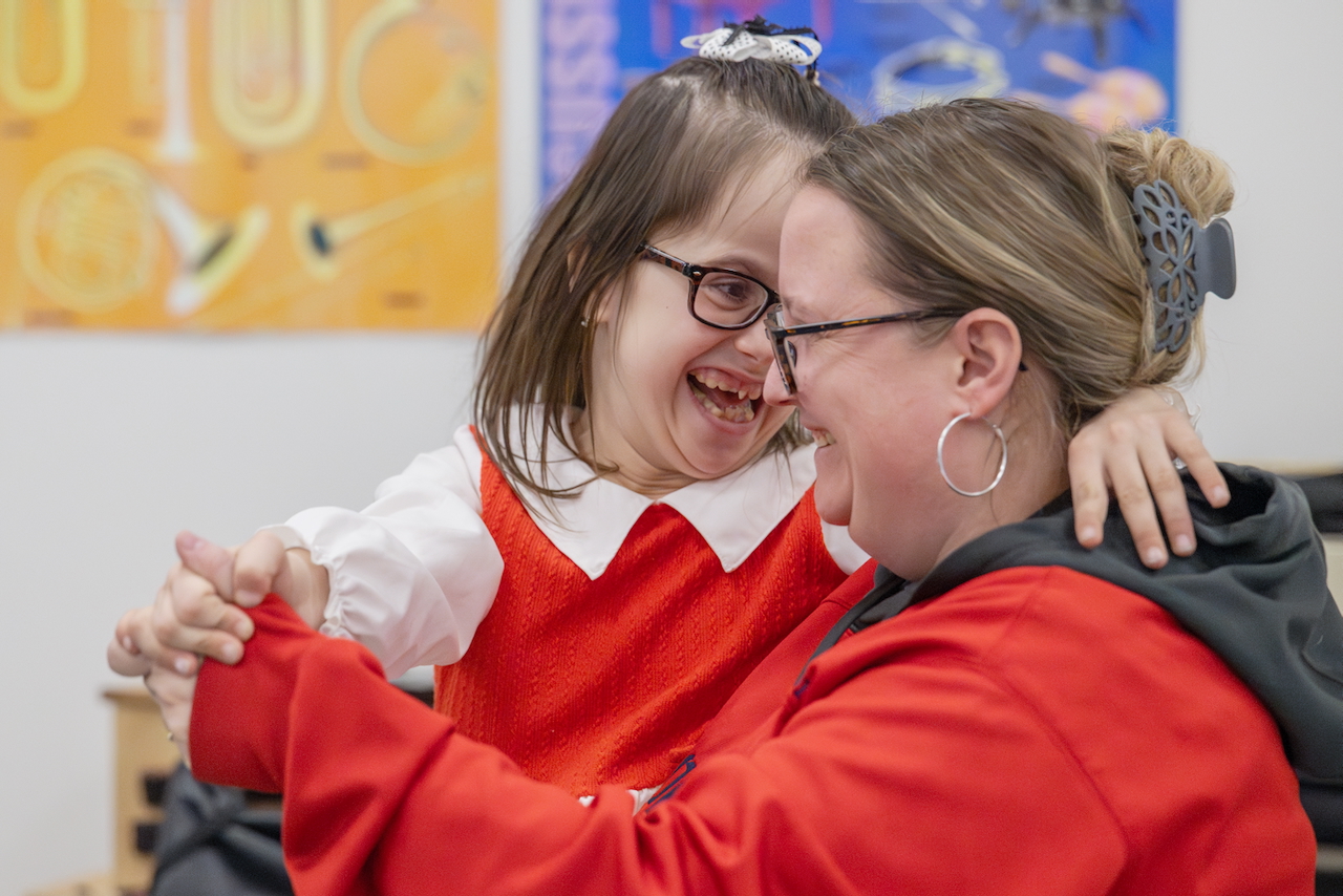 Graduates toss their caps